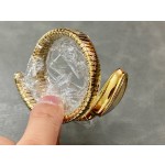 Bulgari Serpentl Collection: White dial with diamonds and gold snake bezel