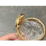 Bulgari Serpentl Collection: White dial with diamonds and gold snake bezel