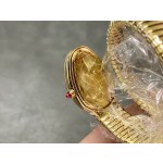 Bulgari Serpentl Collection: White dial with diamonds and gold snake bezel
