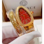 Bulgari Serpentl Collection: Red dial with diamonds and gold snake bezel