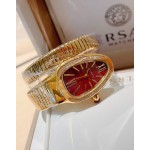Bulgari Serpentl Collection: Red dial with diamonds and gold snake bezel