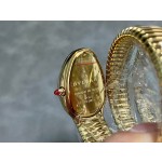 Bulgari Serpentl Collection: Red dial with diamonds and gold snake bezel