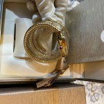 Bulgari Serpentl Collection: White dial with diamonds and gold snake bezel