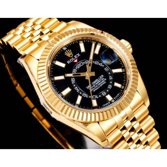 Navigator series men's watch, black dial, gold bezel, 42mm, gold five-link bracelet.