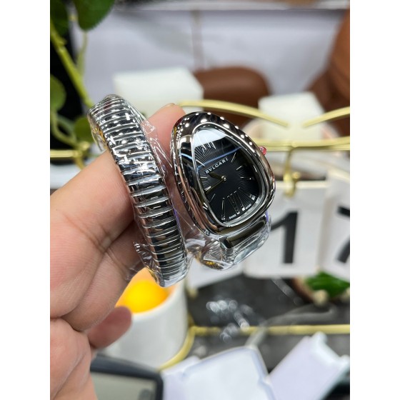 Bulgari Serpenti series, black dial, silver snake bezel