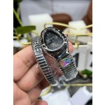 Bulgari Serpenti series, black dial, silver snake bezel