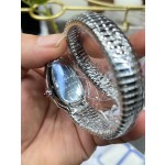 Bulgari Serpenti series, black dial, silver snake bezel