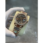 Sunday calendar series men's watch, brown dial, diamond-set bezel, 40mm, rose gold President-style bracelet.