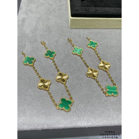 Four-leaf clover gold-interspersed green floral bracelet