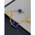 Four-leaf clover dark blue and gold laser-cut multi-strand bracelet