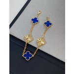Four-leaf clover dark blue and gold laser-cut multi-strand bracelet