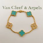 Four-leaf clover light blue and gold diamond-studded bracelet