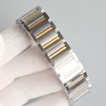 Cartier Tank series, silver bezel, two-tone gold and silver bracelet.