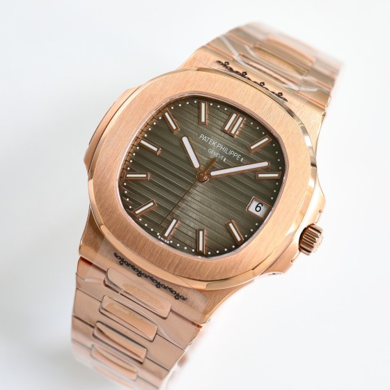 Patek Philippe Nautilus series, wave-pattern dial, 40mm diameter, 8.8mm thickness.