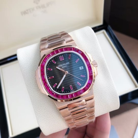 Patek Philippe Nautilus 5711, black dial, 40mm diameter, 8.8mm thickness.