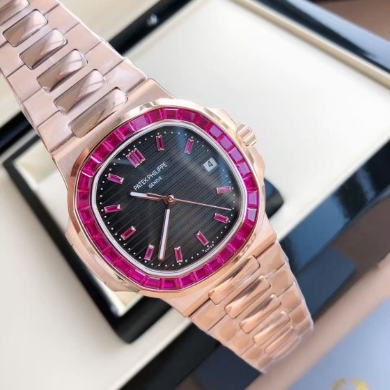 Patek Philippe Nautilus 5711, black dial, 40mm diameter, 8.8mm thickness.