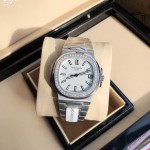 Patek Philippe sports watch: 40mm dial, 8.8mm thickness.