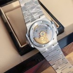 Patek Philippe sports watch: 40mm dial, 8.8mm thickness.